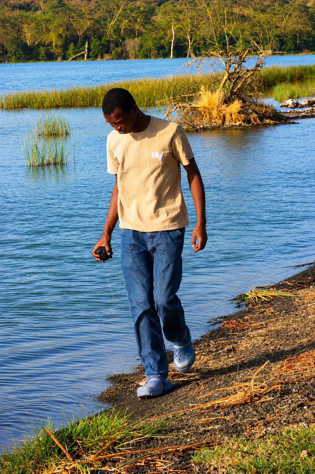 Spegieu walking beside the water